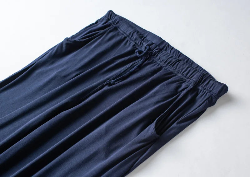 Men's spring and summer new modal pajamas two-piece short-sleeved trousers thin large size loose sports home wear suit sleepwear