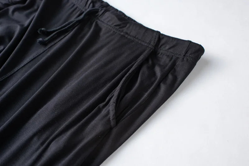 Men's spring and summer new modal pajamas two-piece short-sleeved trousers thin large size loose sports home wear suit sleepwear