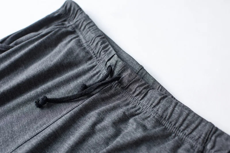 Men's spring and summer new modal pajamas two-piece short-sleeved trousers thin large size loose sports home wear suit sleepwear