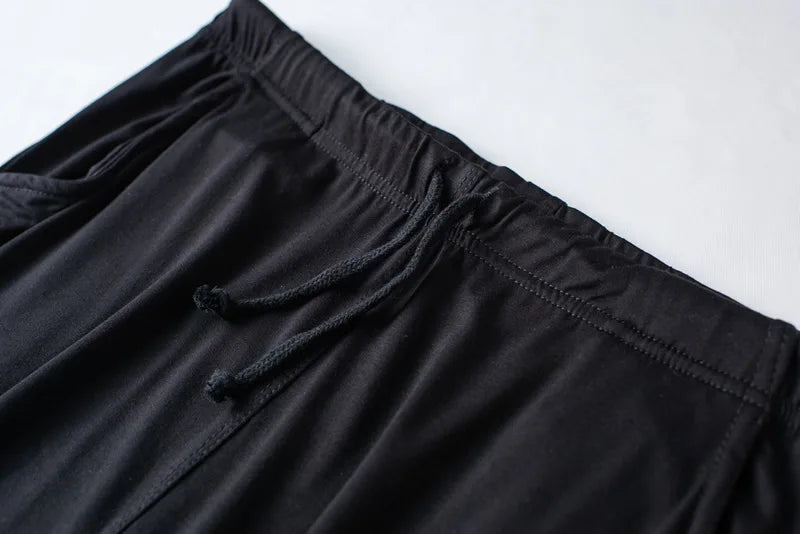 Men's spring and summer new modal pajamas two-piece short-sleeved trousers thin large size loose sports home wear suit sleepwear