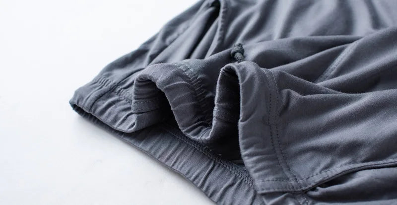 Men's spring and summer new modal pajamas two-piece short-sleeved trousers thin large size loose sports home wear suit sleepwear
