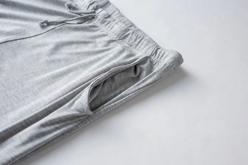 Men's spring and summer new modal pajamas two-piece short-sleeved trousers thin large size loose sports home wear suit sleepwear