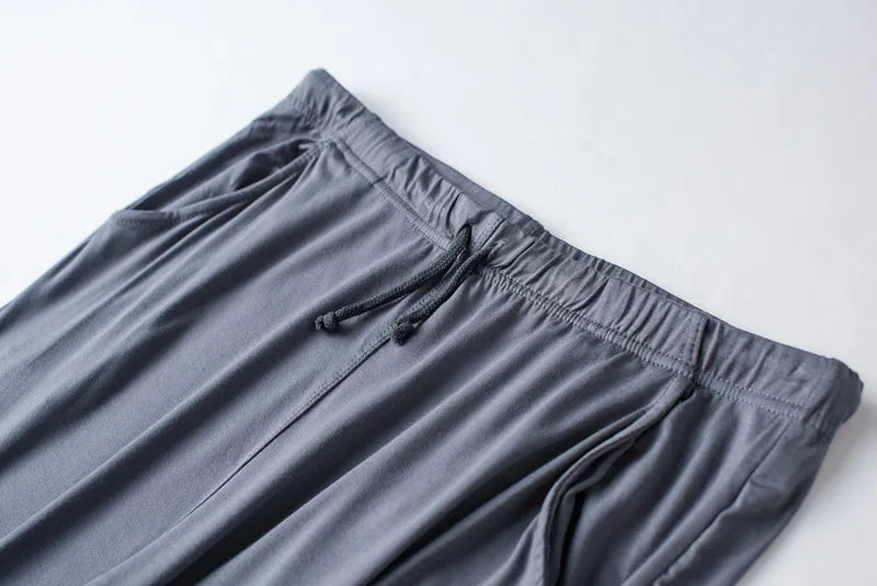 Men's spring and summer new modal pajamas two-piece short-sleeved trousers thin large size loose sports home wear suit sleepwear