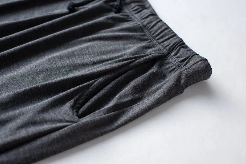 Men's spring and summer new modal pajamas two-piece short-sleeved trousers thin large size loose sports home wear suit sleepwear