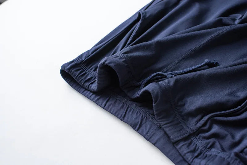 Men's spring and summer new modal pajamas two-piece short-sleeved trousers thin large size loose sports home wear suit sleepwear