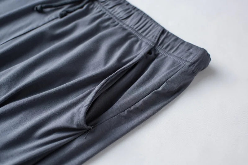 Men's spring and summer new modal pajamas two-piece short-sleeved trousers thin large size loose sports home wear suit sleepwear