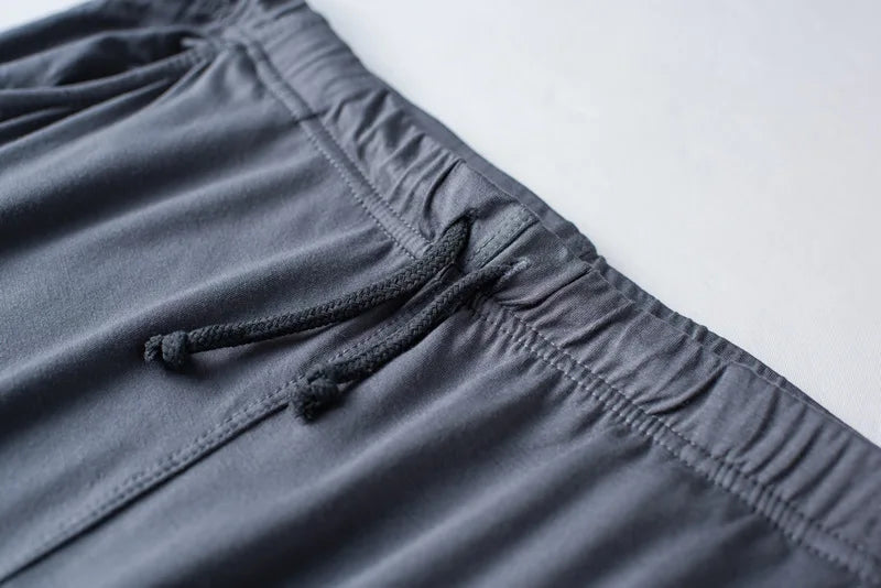 Men's spring and summer new modal pajamas two-piece short-sleeved trousers thin large size loose sports home wear suit sleepwear